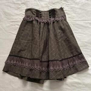 Axes Femme Brown plaid skirt with lace trim and button details Size medium